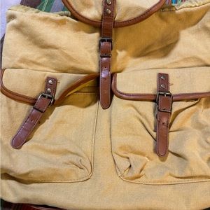 Cute backpack purse with front pockets.